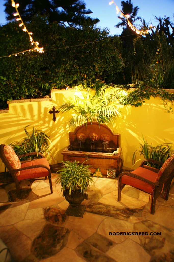 Courtyard for Laguna Beach residence. The sunny neutral paint adds warmth. Reedesign Interiors Laguna Beach.